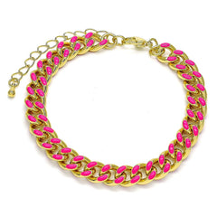 Chunky gold and pink statement bracelet with wide textured band, perfect for bold fashion styling and stacking.