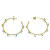 Set of chunky textured gold hoop earrings, ideal for bold and fashion-forward styling.