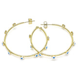 Set of chunky textured gold hoop earrings, ideal for bold and fashion-forward styling.