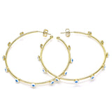 Set of evil eye gold hoop earrings, ideal for bold and fashion-forward styling.
