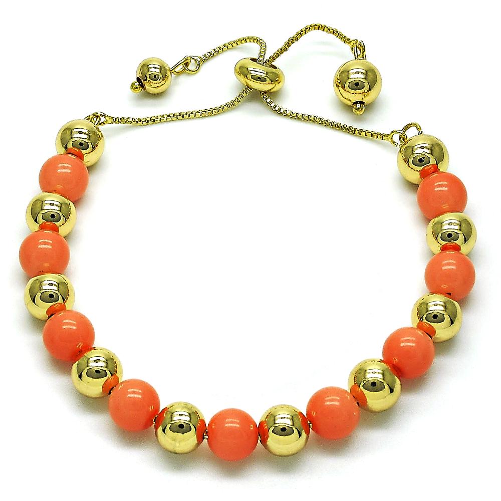 Bold bracelet featuring vibrant orange, coral, and gold beads for a cheerful, summer-ready statement.