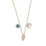 Mixed metal necklace featuring a gold chain and silver evil eye pendant with sparkling crystal detail.
