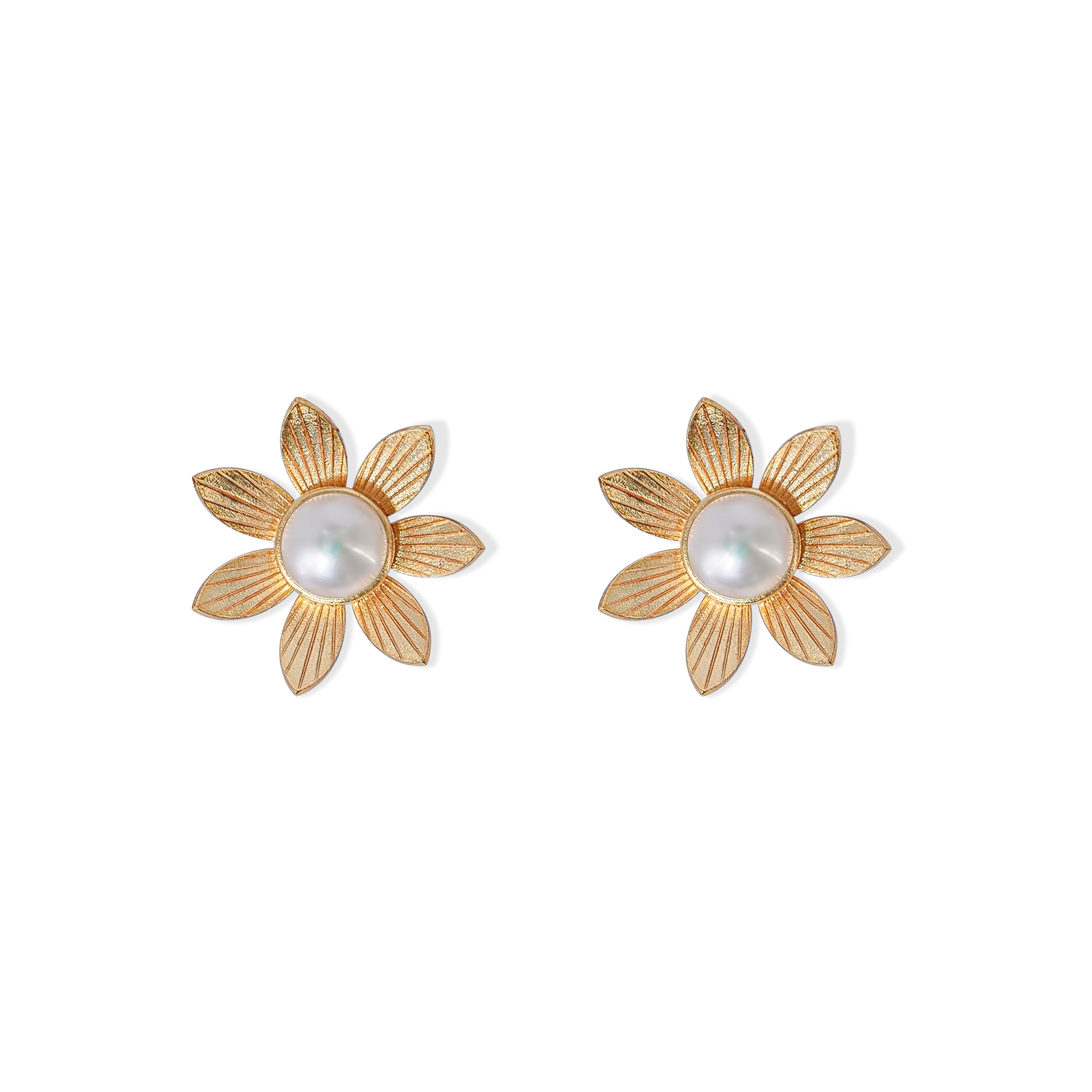 Textured gold flower stud earrings featuring radiant faux pearl centers, blending natural elegance with vintage charm.