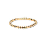Gold tone stretch bracelet with with a stretch fit, perfect for layering or minimalist wear.
