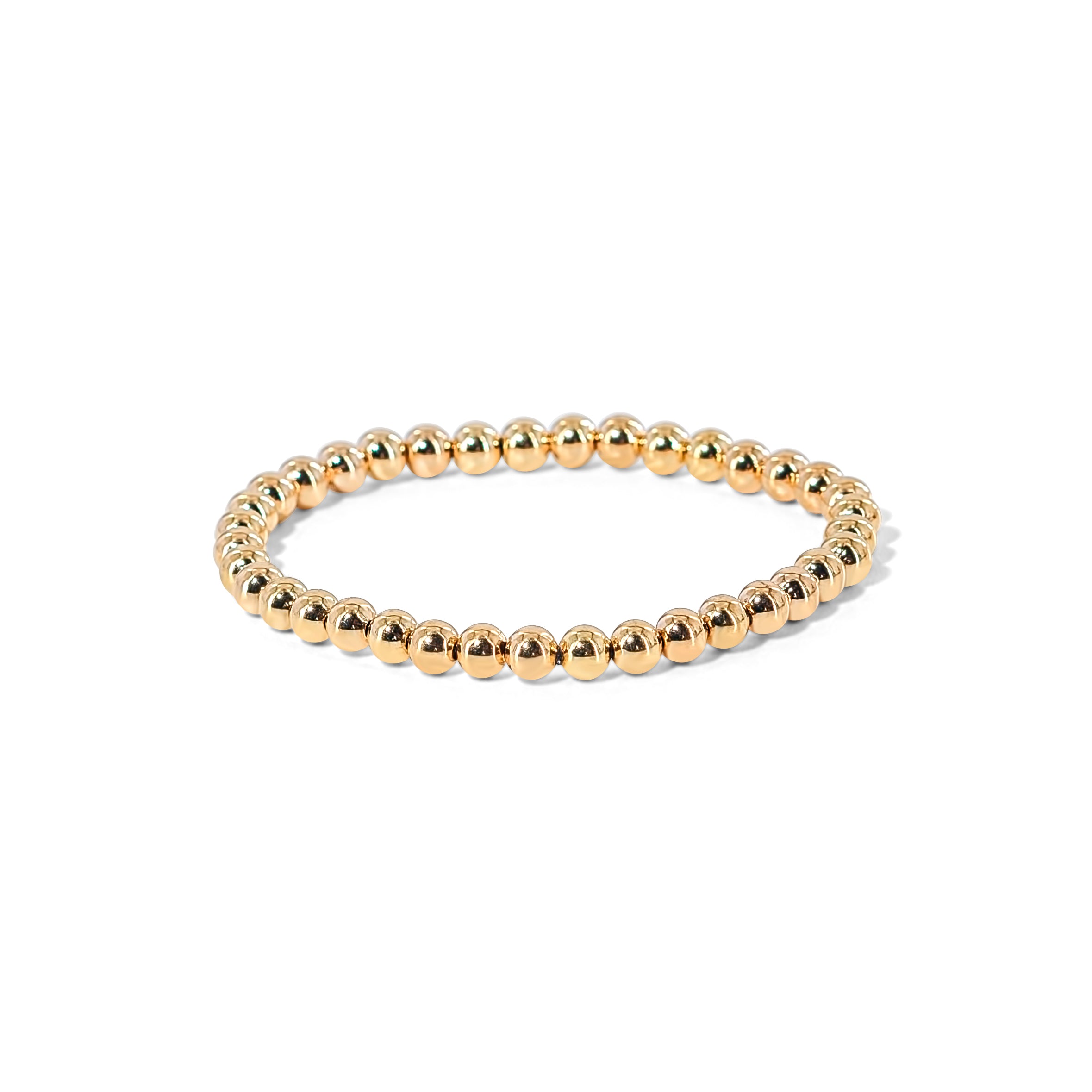 Gold tone stretch bracelet with with a stretch fit, perfect for layering or minimalist wear.