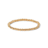 Classic gold beaded ring with a stretch fit, perfect for layering or minimalist wear.