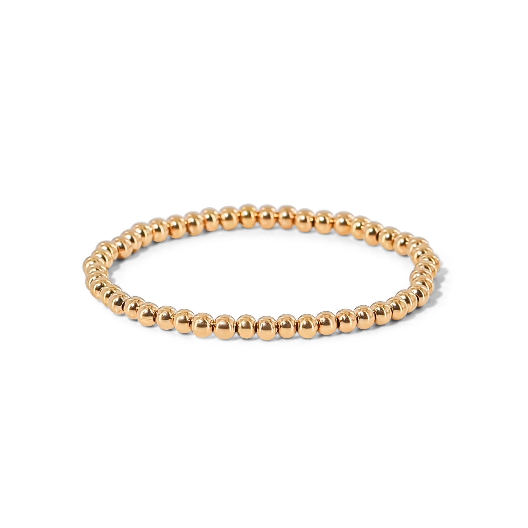 Classic gold beaded ring with a stretch fit, perfect for layering or minimalist wear.