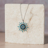 Starburst Pendant Necklace in Sterling Silver with Pavé Stones
