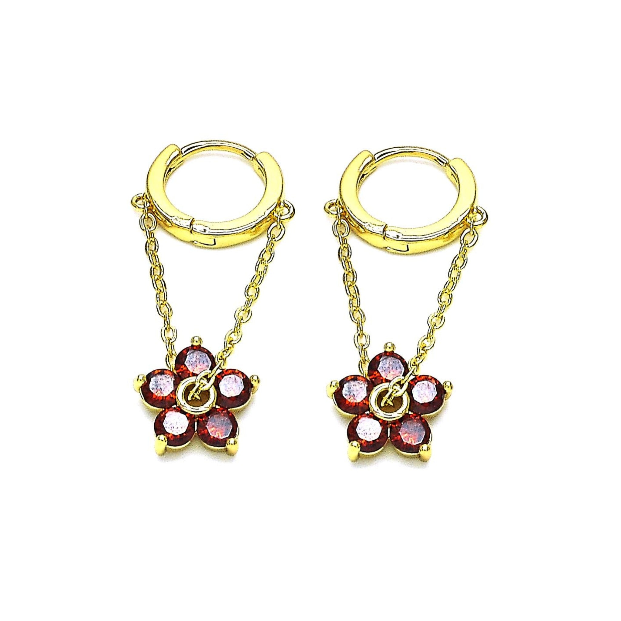 gold dangle flower earrings red flower gemstones on white background