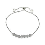 Silver flower adjustable bolo bracelet on white background