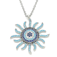 Statement silver necklace with a radiant sunburst pendant inlaid with blue, turquoise, and white crystals, exuding celestial-inspired charm.