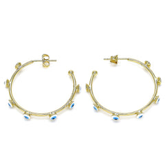 Set of chunky textured gold hoop earrings, ideal for bold and fashion-forward styling.