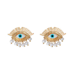 Gold eye-shaped earrings with blue evil eye centers, featuring cascading pearl drop details for a bold and protective statement look.