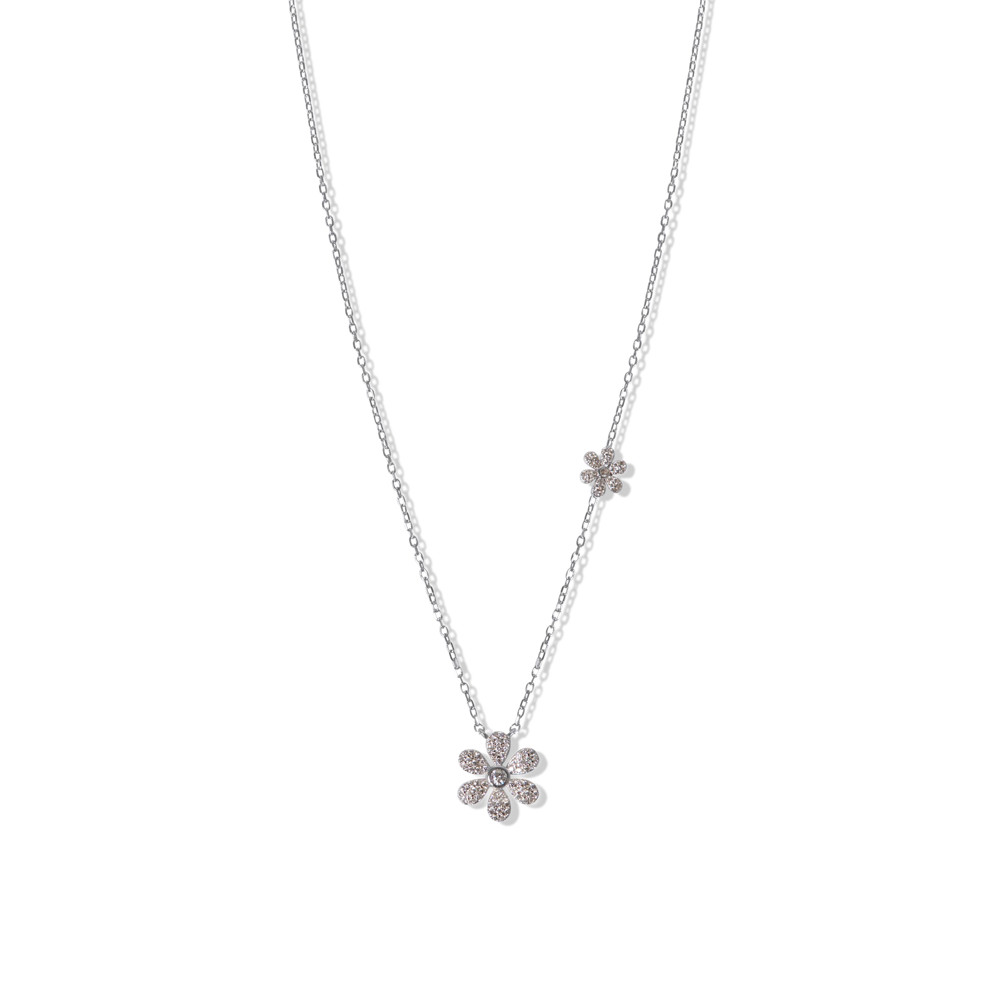 SterlingSilverChainDelicateFlowerPendant.jpg: Jewelry piece on a clean white background